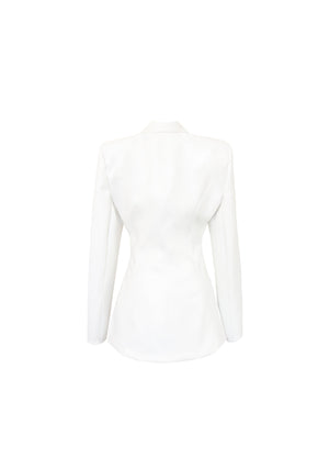 White fitted leather coat with exaggerated shoulders.